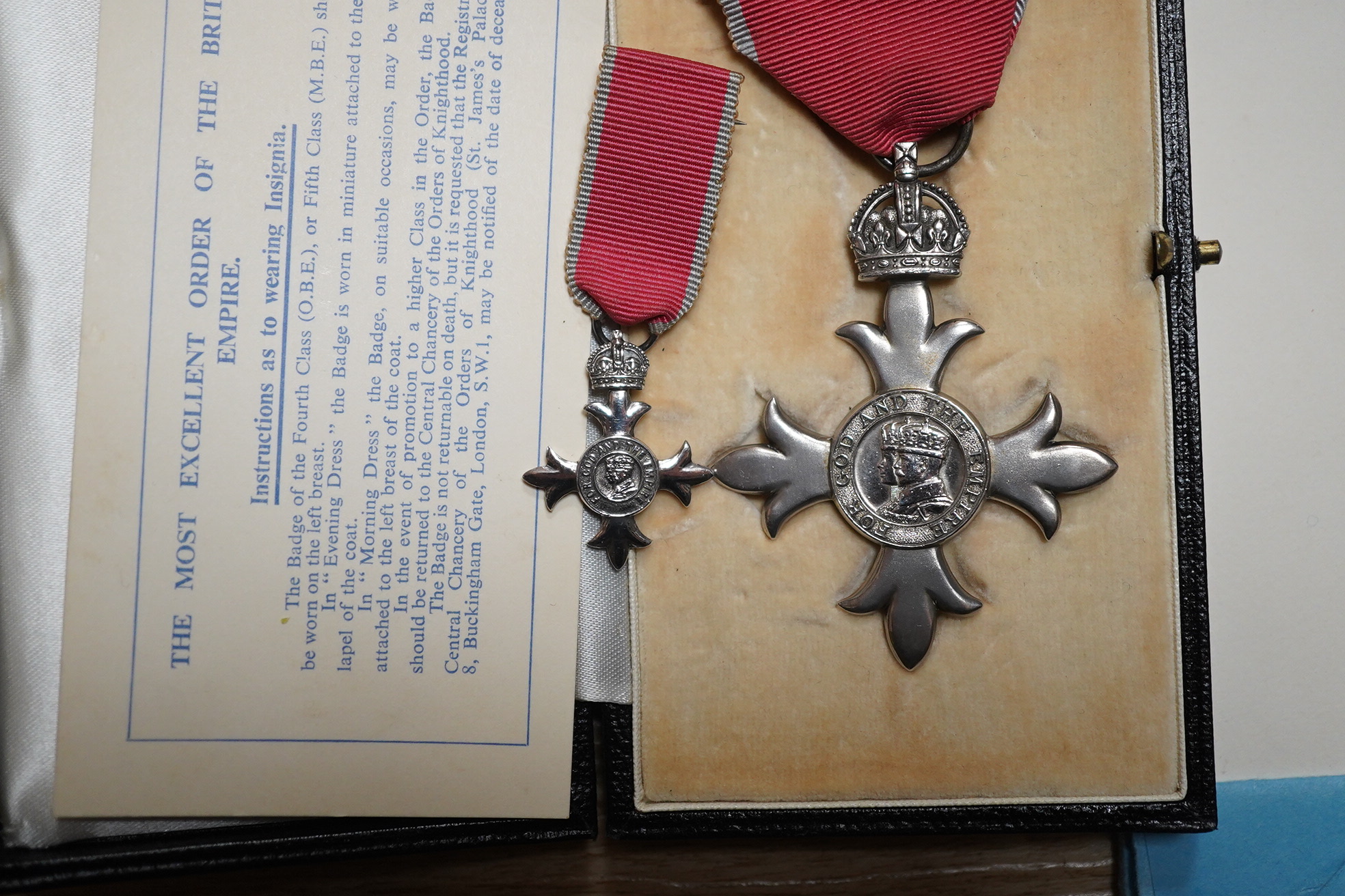 An MBE for Archibald Lees with miniature and an Imperial Service Medal for Thomas Lees, a silver coaster and silver match case with coronet over ‘E’ and ‘Holyrood 1925’ to reverse